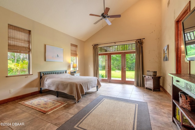 bedroom featuring access to exterior, high vaulted ceiling, multiple windows, and ceiling fan