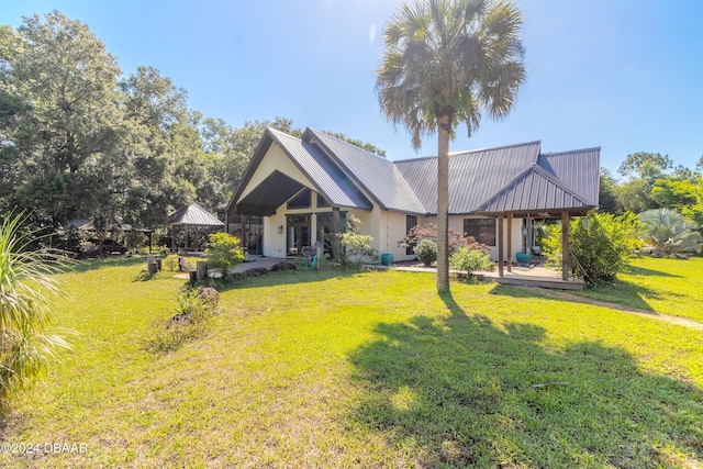 view of front of home with a front yard