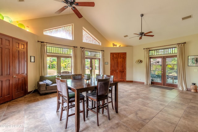 dining room with high vaulted ceiling, french doors, ceiling fan, and plenty of natural light