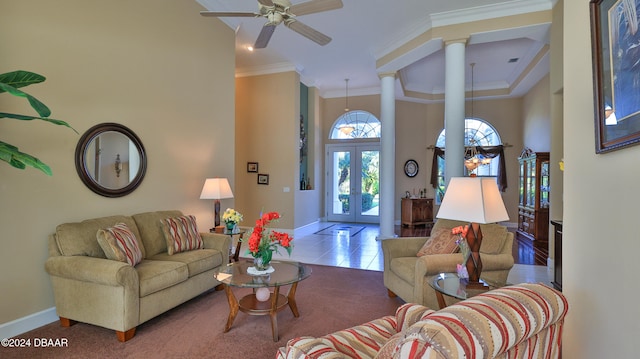 carpeted living room featuring ceiling fan, french doors, and ornamental molding