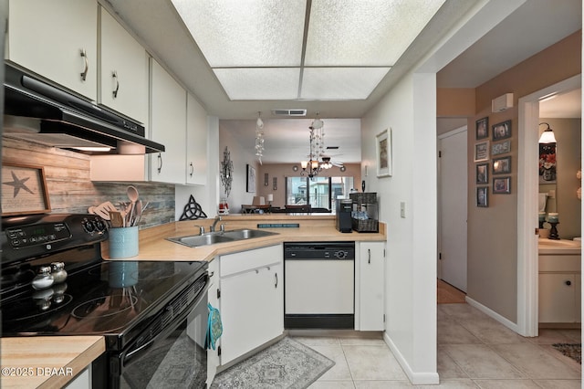 3333 S Ridgewood Ave Unit 8B, Port Orange, FL 32129 - kitchen featuring electric range, white dishwasher, under cabinet range hood, a chandelier, and light tile patterned floors