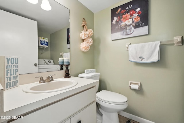 3333 S Ridgewood Ave Unit 8B, Port Orange, FL 32129 - half bathroom featuring vanity and washer / clothes dryer