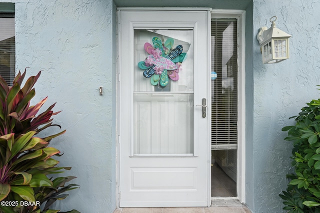 3333 S Ridgewood Ave Unit 8B, Port Orange, FL 32129 - property entrance featuring stucco siding