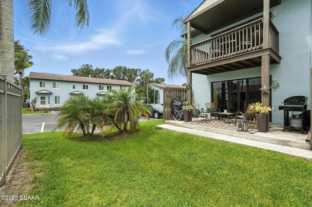 3333 S Ridgewood Ave Unit 8B, Port Orange, FL 32129 - view of green lawn with a balcony and a patio area