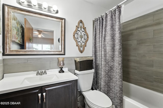 3333 S Ridgewood Ave Unit 8B, Port Orange, FL 32129 - bathroom featuring vanity, shower / tub combo with curtain, ceiling fan, and tile walls