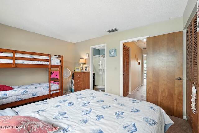 3333 S Ridgewood Ave Unit 8B, Port Orange, FL 32129 - bedroom with a closet, carpet, and ensuite bathroom