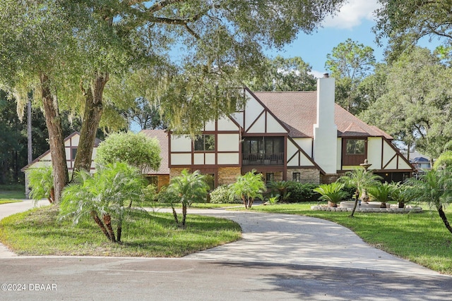 view of front of home with a front yard