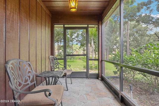 sunroom / solarium with wooden ceiling