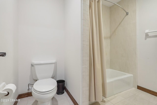 bathroom featuring toilet, shower / bath combination with curtain, and tile patterned floors