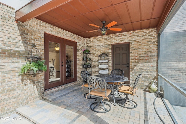 view of patio / terrace with french doors and ceiling fan