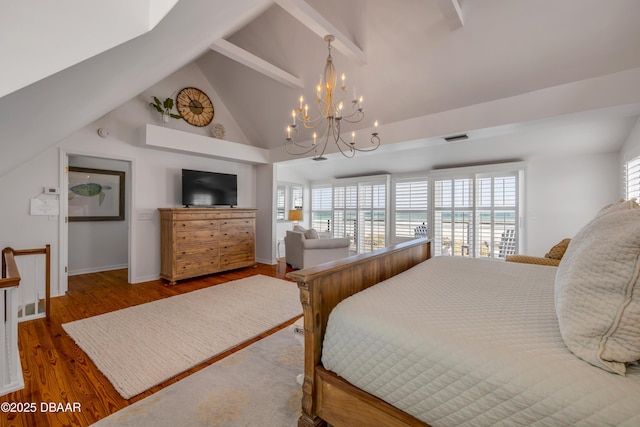 bedroom with a chandelier, wood finished floors, visible vents, baseboards, and beamed ceiling