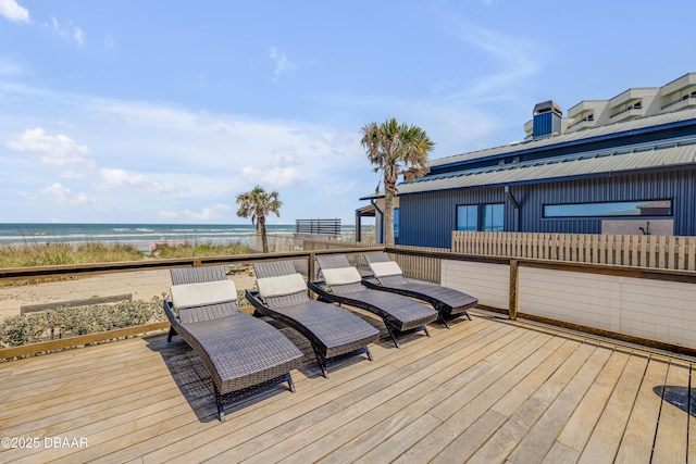 wooden deck with a water view