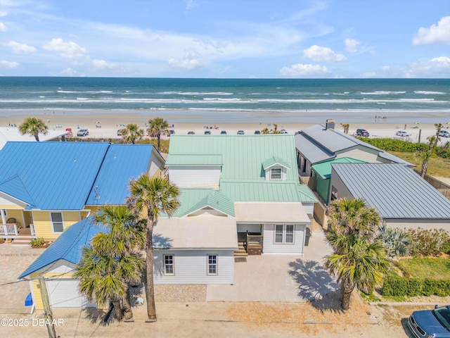 aerial view featuring a beach view and a water view