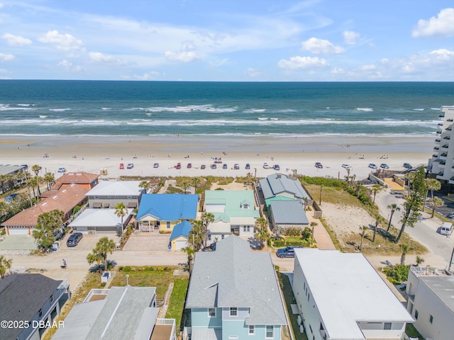 aerial view featuring a beach view and a water view