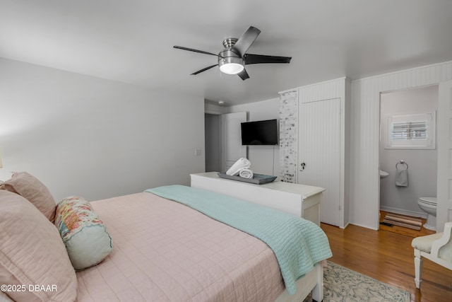 bedroom featuring wood finished floors and a ceiling fan