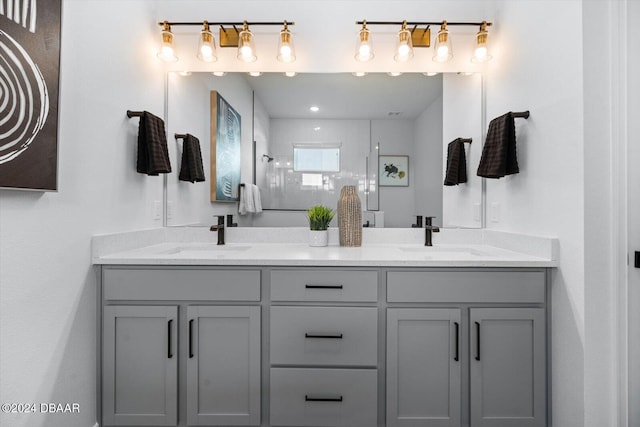 bathroom with vanity and walk in shower