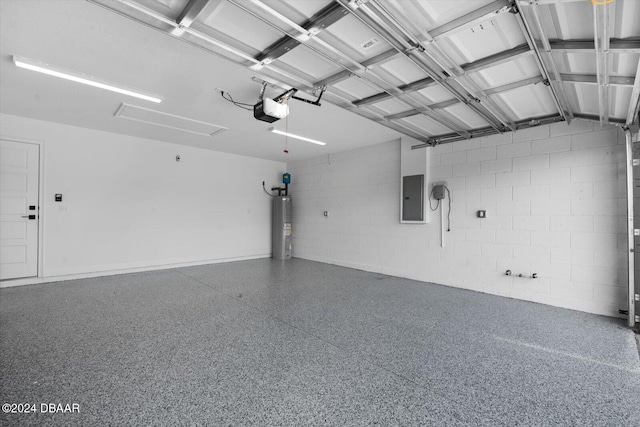 garage featuring electric panel, water heater, and a garage door opener