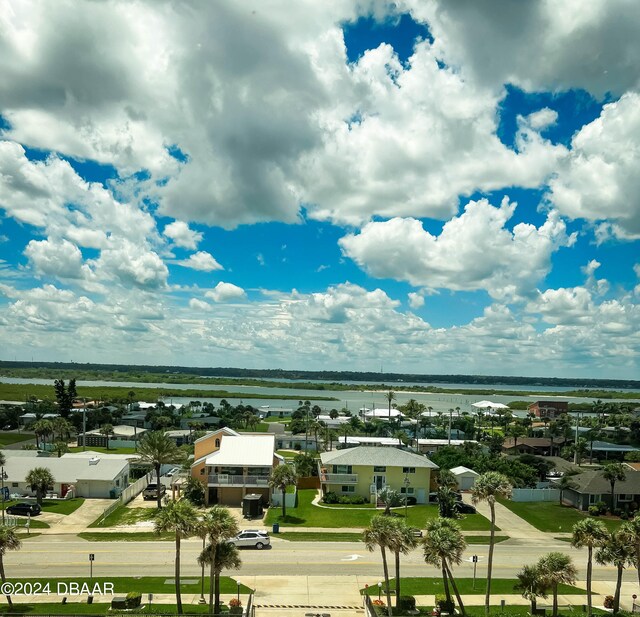 drone / aerial view with a water view