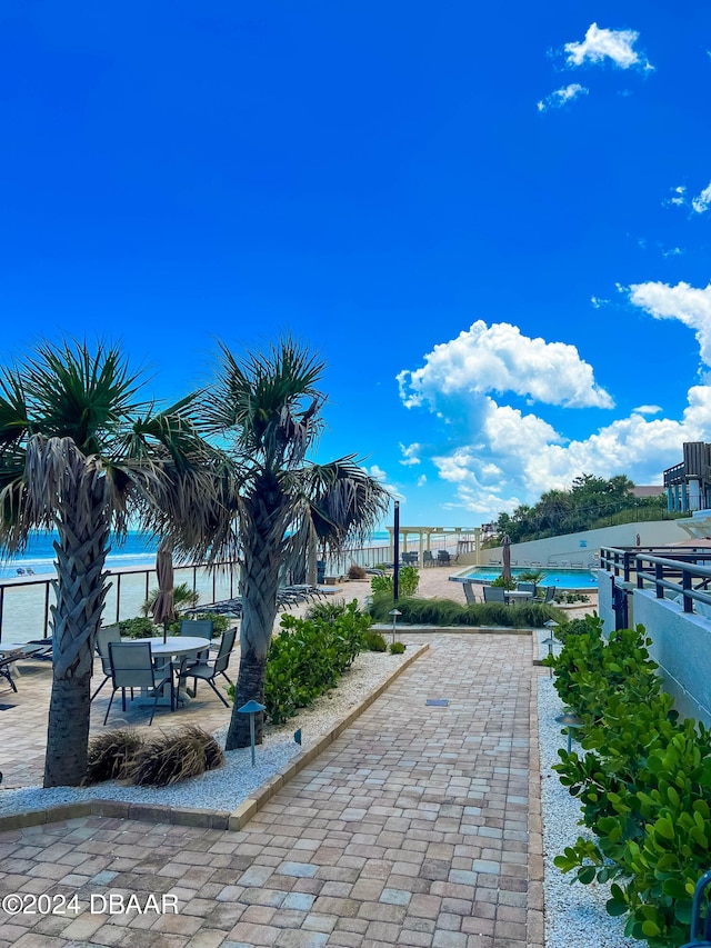 view of patio featuring a water view