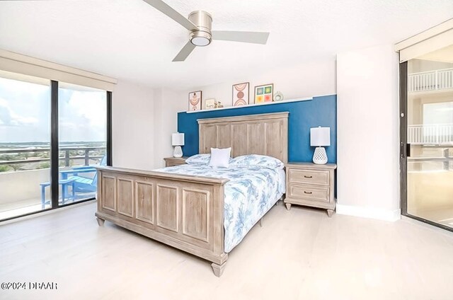 bedroom featuring light hardwood / wood-style floors and ceiling fan