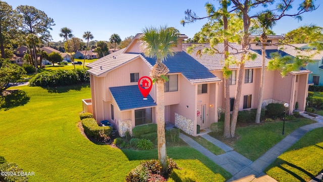 view of front of home with a front yard