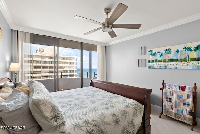 bedroom with ornamental molding, access to outside, a water view, and ceiling fan