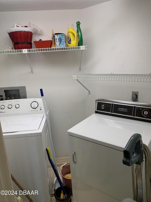 washroom featuring separate washer and dryer