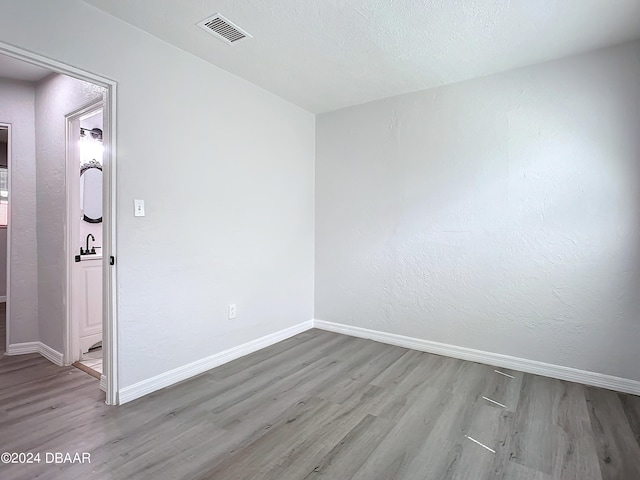 736 N Segrave St, Daytona Beach, FL 32114 - unfurnished room featuring light hardwood / wood-style floors