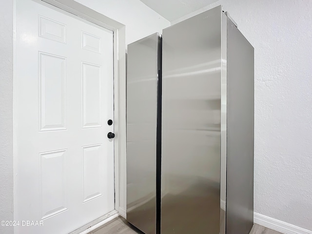 736 N Segrave St, Daytona Beach, FL 32114 - bathroom featuring hardwood / wood-style floors