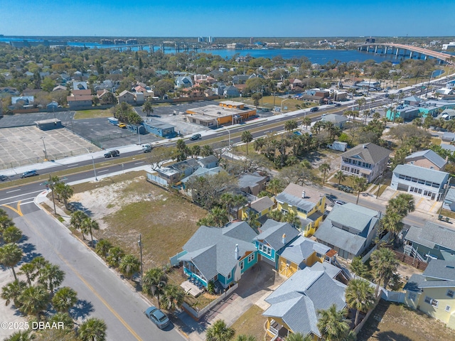 aerial view featuring a residential view and a water view