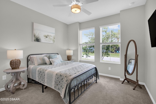 500 Barefoot Life Ln, Daytona Beach, FL 32124 - carpeted bedroom featuring baseboards and a ceiling fan