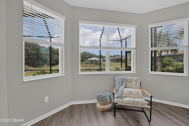 500 Barefoot Life Ln, Daytona Beach, FL 32124 - sitting room with plenty of natural light and wood finished floors