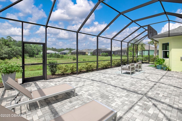 500 Barefoot Life Ln, Daytona Beach, FL 32124 - view of patio / terrace featuring a residential view and a lanai