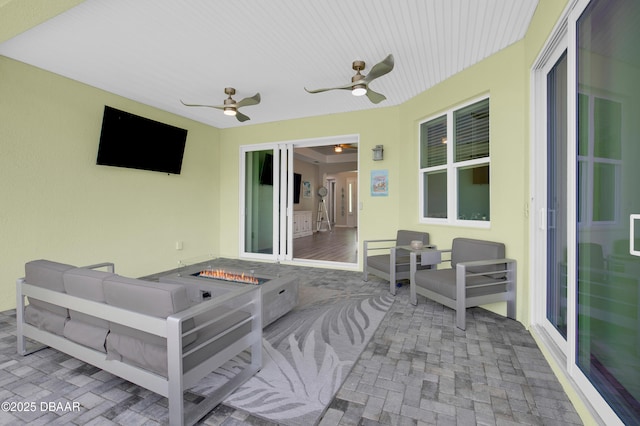 500 Barefoot Life Ln, Daytona Beach, FL 32124 - view of patio / terrace with ceiling fan and an outdoor living space with a fire pit