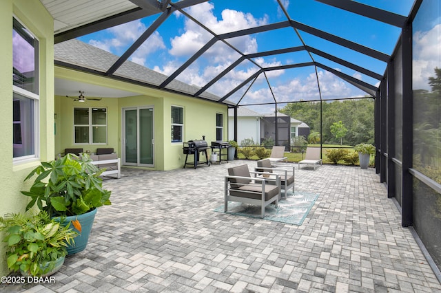 500 Barefoot Life Ln, Daytona Beach, FL 32124 - view of patio / terrace featuring an outdoor living space, a ceiling fan, area for grilling, and a lanai