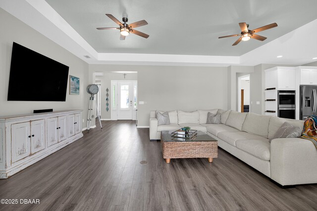 500 Barefoot Life Ln, Daytona Beach, FL 32124 - living room with ceiling fan, a tray ceiling, dark wood finished floors, and recessed lighting