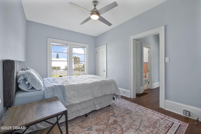 401 N Oleander Ave, Daytona Beach, FL 32118 - bedroom with baseboards, wood finished floors, and a ceiling fan