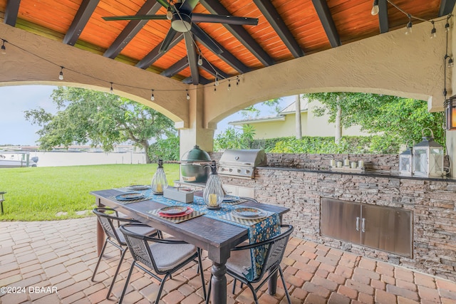 view of patio / terrace featuring a gazebo, grilling area, area for grilling, and ceiling fan