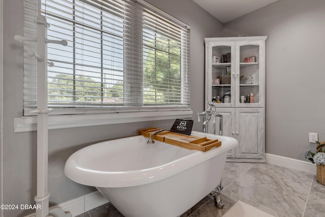 bathroom with a bath