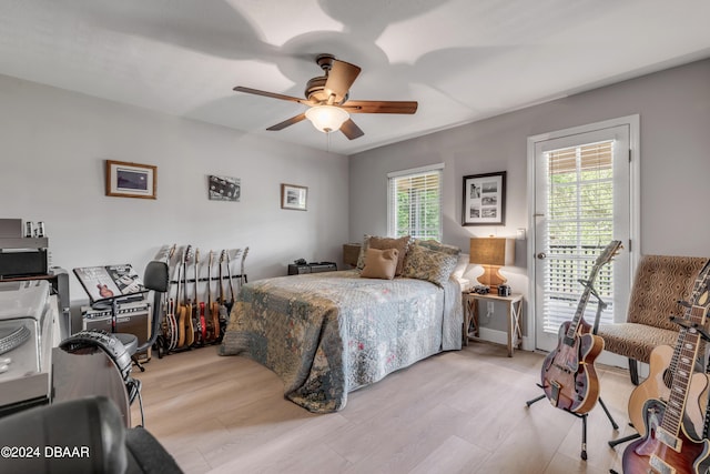 bedroom featuring ceiling fan and light wood-type flooring