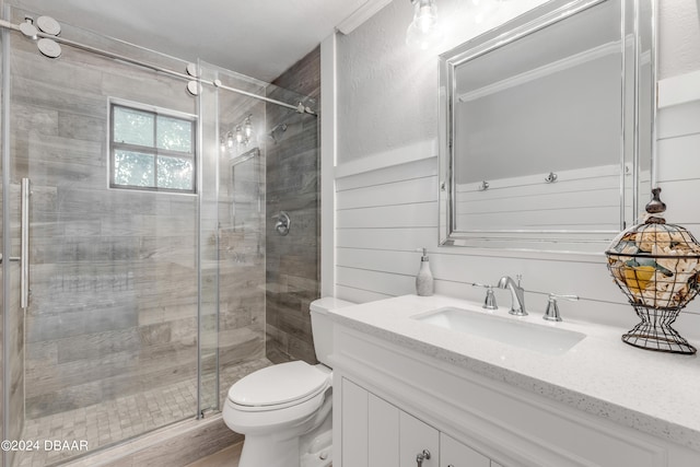 bathroom featuring hardwood / wood-style floors, walk in shower, vanity, and toilet