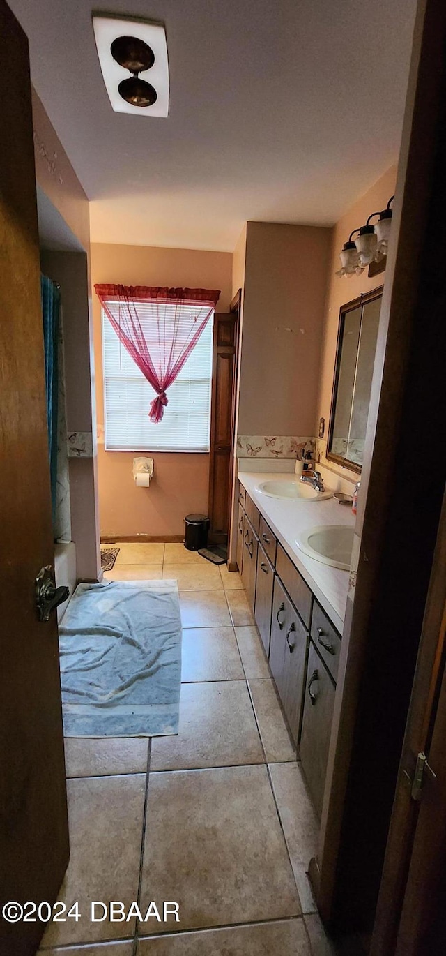 bathroom with vanity and tile patterned floors