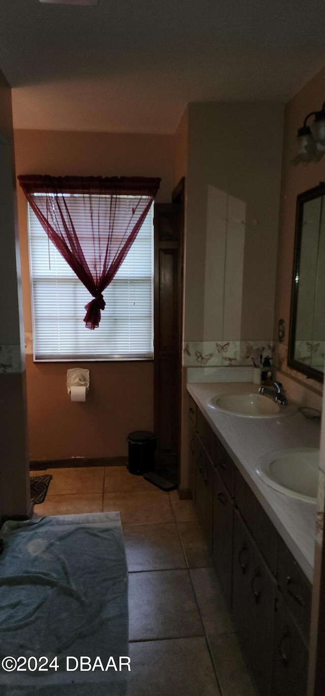 bathroom with vanity and tile patterned floors