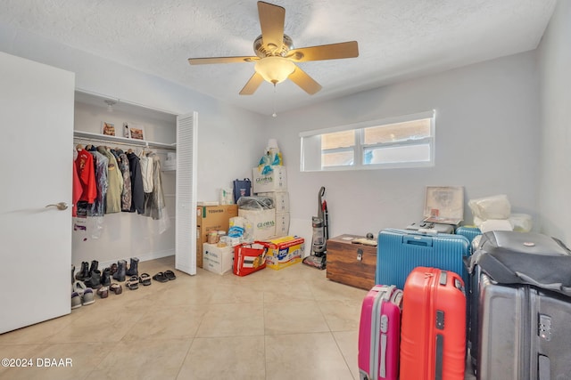 interior space featuring ceiling fan