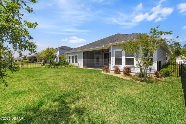 133 Wood Stork Ln, Palm Coast, FL 32164 - back of house featuring a sunroom