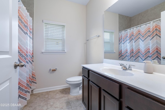 133 Wood Stork Ln, Palm Coast, FL 32164 - bathroom featuring vanity, toilet, baseboards, tile patterned flooring, and a shower with curtain