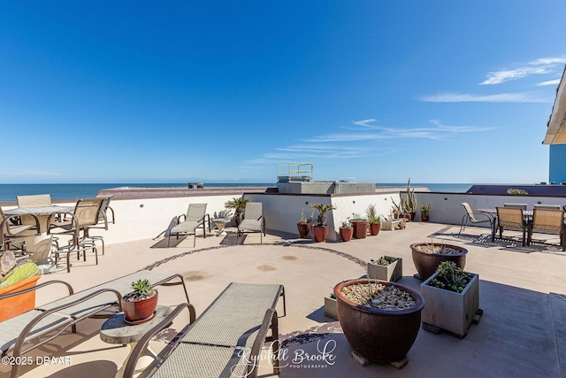 view of patio / terrace featuring a water view