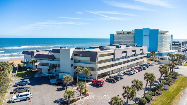 bird's eye view with a beach view and a water view