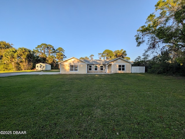 ranch-style house with a front yard