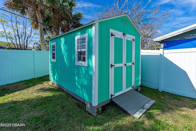 view of outdoor structure with a yard